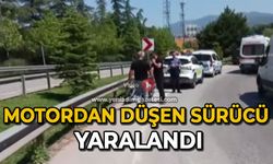 Motordan düşen sürücü yaralandı