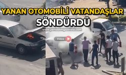 Yanan otomobili vatandaşlar söndürdü