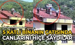 5 katlı binanın çatısında canlarını hiçe saydılar