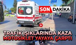 Trafik ışıklarında kaza: Motosiklet yayaya çarptı