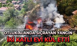 Otluk alanda sıçrayan yangın iki katlı evi kül etti