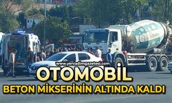 Otomobil beton mikserinin altında kaldı