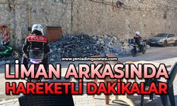 Polis ekipleri liman arkasında