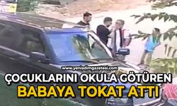 Çocuklarını okula götüren babaya tokat attı