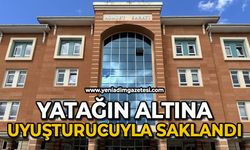 Yatağın altına uyuşturucuyla saklandı