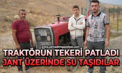 Traktörün tekerliği patladı, jant üzerinde orman ekiplerine su taşıdılar