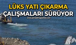 Denize indirildikten sonra batan lüks yatı çıkarma çalışmaları sürüyor