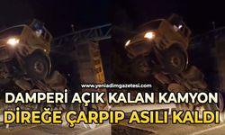 Damperi açık kamyon KGYS direğine çarparak asılı kaldı: 1 yaralı