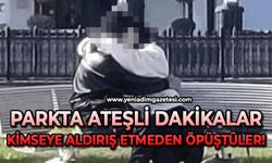 Parkta ateşli dakikalar: Kimseye aldırış etmeden öpüştüler!