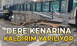 Dere kenarına kaldırım yapılıyor