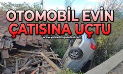 Zonguldak'ta kontrolden çıkan otomobil evin çatısına uçtu