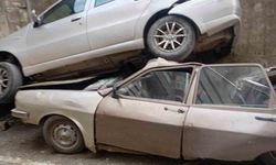 Rampada geriye kayan otomobil 8 metreden düşerek park halindeki aracın üzerine çıktı