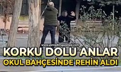 Kızını rahatsız ettiğini iddia ettiği genci okul bahçesinde rehin aldı