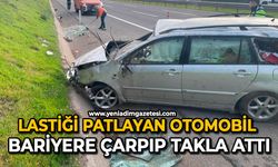 Lastiği patlayan otomobil bariyere çarpıp takla attı