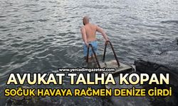 Avukat soğuk havaya aldırış etmeden denize girdi