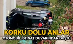 Korku dolu anlar: Otomobil istinat duvarından düştü