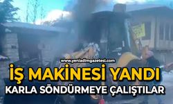 İş makinesi yandı: Karla söndürmeye çalıştılar
