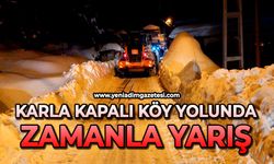 Karla kapalı köy yolunda zamanla yarış