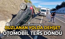 Buzlanan yolda dehşet: Otomobil ters döndü