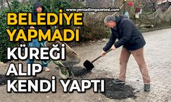 Belediye yapmadı: Küreği alıp kendi yaptı