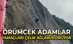Örümcek adamlar yamaçları çelik ağlarla örüyor
