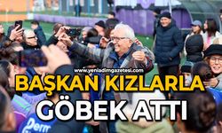 Başkan kızlarla göbek attı