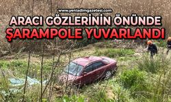 Aracı gözlerinin önünde şarampole yuvarlandı