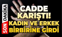 Cadde karıştı: Kadın ve erkek birbirine girdi