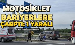 Virajı alamayan motosiklet sürücüsü bariyere çarptı