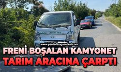 Freni boşalan kamyonet tarım aracına çarptı