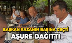 Başkan kazanın başına geçti aşure dağıttı