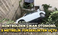 Kontrolden çıkan otomobil 5 metrelik yükseklikten uçtu