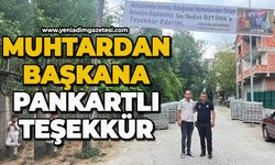 Muhtardan başkana pankartlı teşekkür