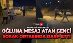 Oğluna mesaj atan genci sokak ortasında darp etti