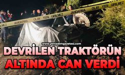 Devrilen traktörün altında can verdi