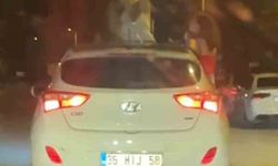 Otomobilden sarkarak dans eden kadınların tehlikeli yolculuğu kamerada