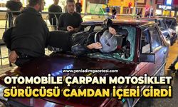 Otomobile çarpan motosiklet sürücüsü camdan içeri girdi