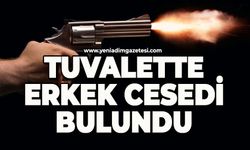 Tuvalette silahla vurulmuş halde ölü bulundu