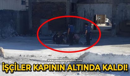 İşçiler kapının altında kaldı!