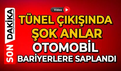 Tünel çıkışında şok anlar: Otomobil bariyerlere saplandı