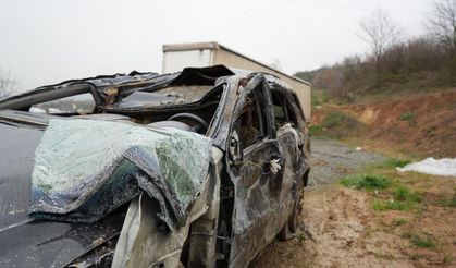Dereye sürüklenen otomobilini bir gün sonra buldu