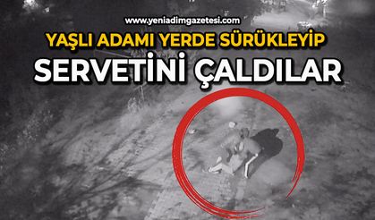 Yaşlı adamı yerde sürükleyip servetini çaldılar