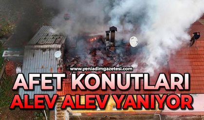 Afet konutları alev alev yanıyor