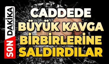 Caddede büyük kavga: Kemer ve ıstakalarla birbirlerine saldırdılar