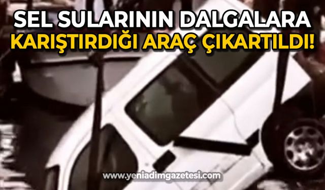 Sel sularının dalgalara karıştırdığı araç denizden çıkartıldı