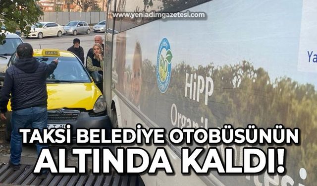 Taksi Belediye otobüsünün altında kaldı