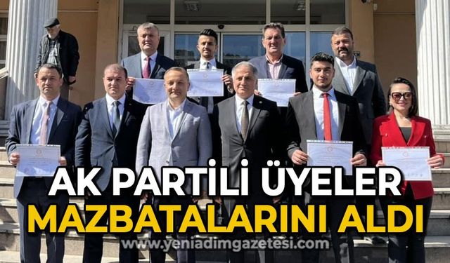 AK Partili üyeler mazbatalarını aldı