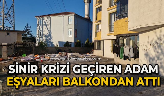 Sinir krizi geçiren adam eşyaları balkondan attı