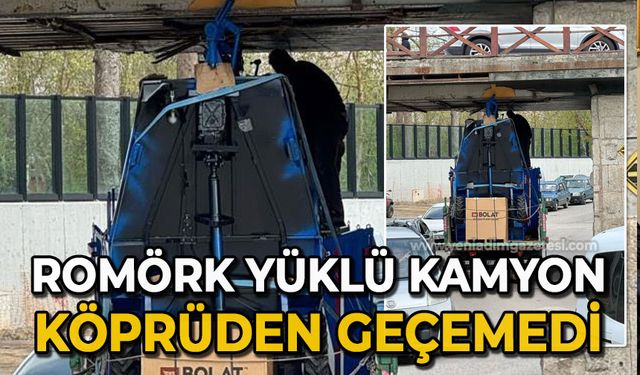Römork yüklü kamyona köprüye takıldı