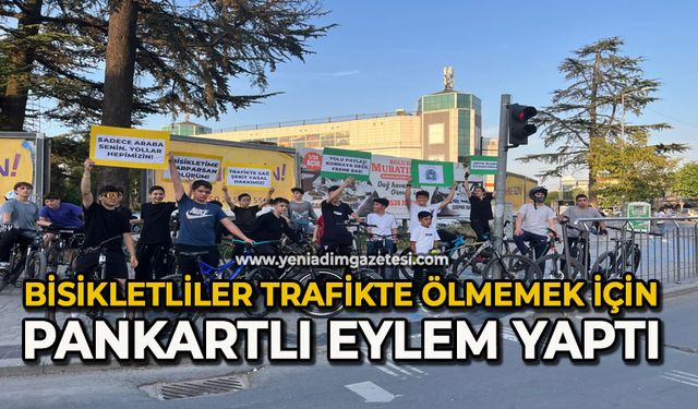Bisikletliler trafikte ölmemek için pankartlı eylem yaptı